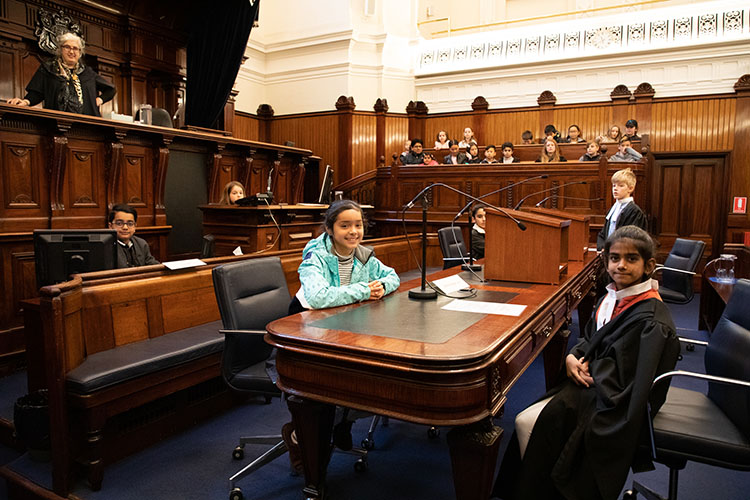 School children take part in a mock trial in Court 1 of the Supreme Court of Victoria.
