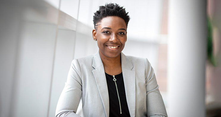 business woman sitting and smiling