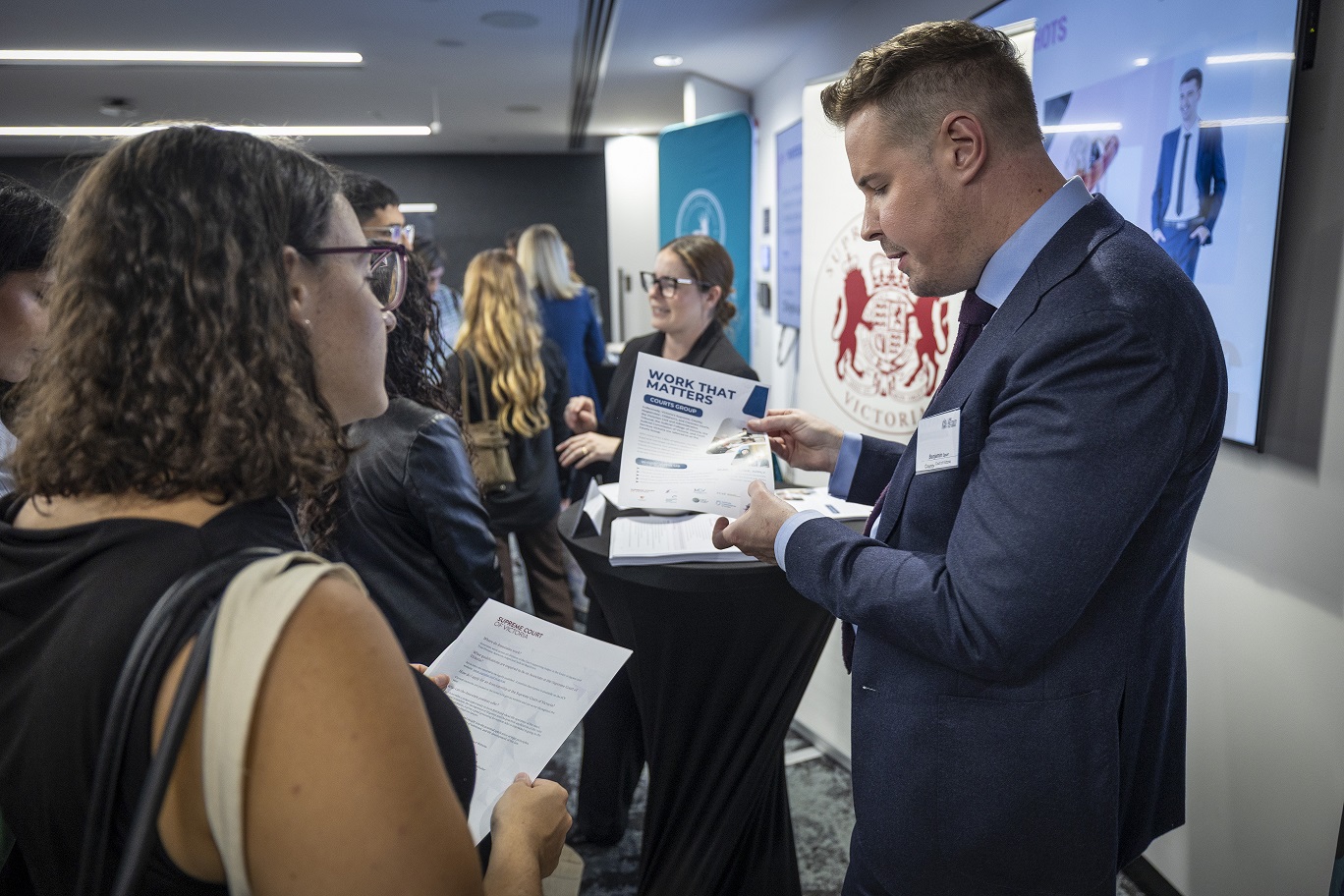 Commercial Court Judicial Services Coordinator Sarah Newland and County Court Judicial Services Coordinator Benjamin Spurr at the Law Institute of Victoria’s Legal Career Pathways event. Source: Law Institute of Victoria